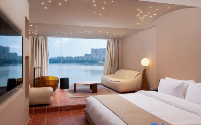 Nanning Leshell Waterside Hotel（Wanxiang City Fangte ASEAN God Painting Shop) – Guest Rooms – Nanning