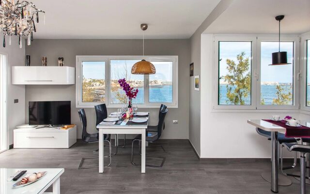 Coral Bay Beachfront Apartment by Vacanzy Collection