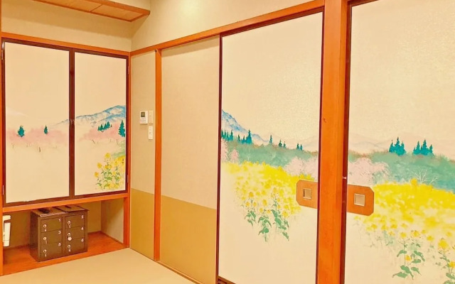 Hotel Hoho "A hotel overlooking the Echigo Plain and the Yahiko mountain range"