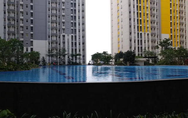Comfy 2 Bedroom at The Springlake Apartment by Travelio