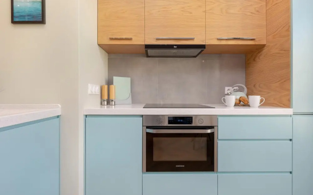 Bright Blue Apartment by Renters