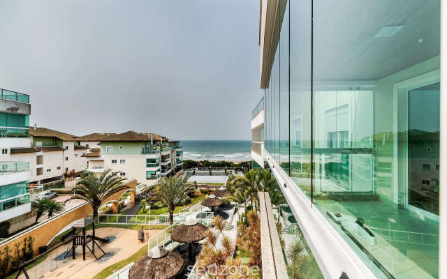 Apto beira mar com vista Praia do Santinho ASR204