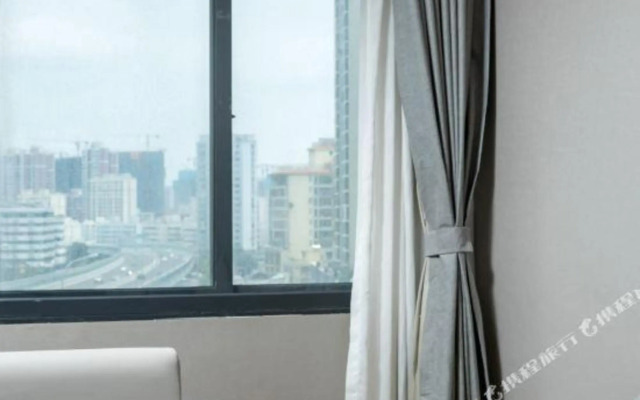 Echarm Hotel (Haikou Shangbang Baihui City Haiken Plaza)