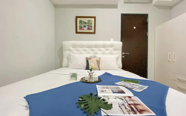 Minimalist And Cozy 1BR at Royal Heights Apartment