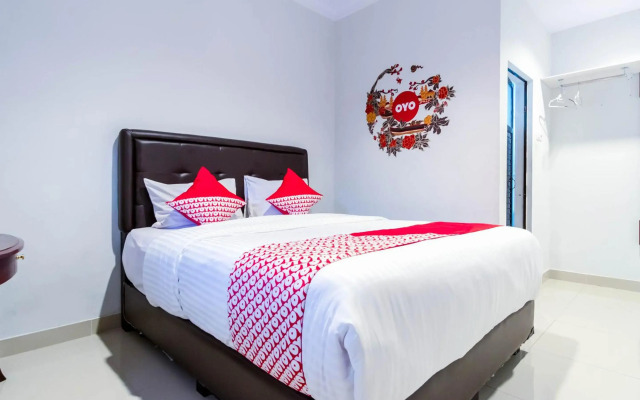 Super OYO 283 Helvetia Residence