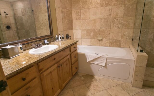 Massive Condo with Views and Rustic Furnishings by RedAwning