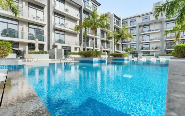 Waves - Stylish 1BR in JVC with Balcony & Pool