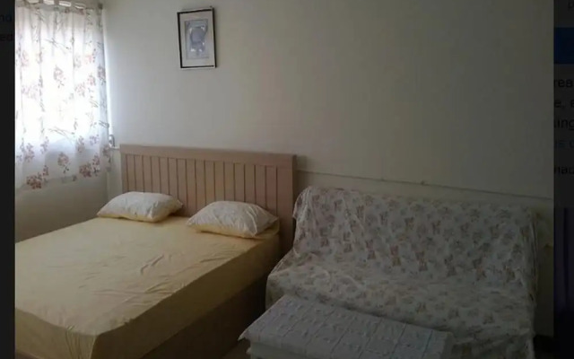 "room in Studio - T8 Guest House Don Mueang Challenger Triple Room"