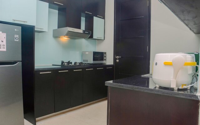 Comfy and Spacious 2BR The Masterpiece Epicentrum Apartment By Travelio