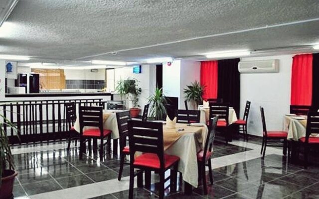 Milano Hotel Suites