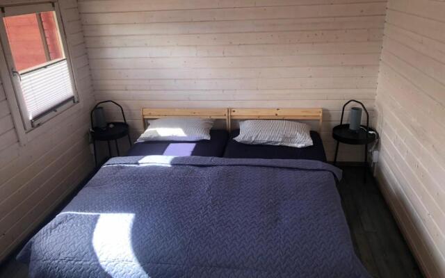 WOMOCAMP Holzhütte 2