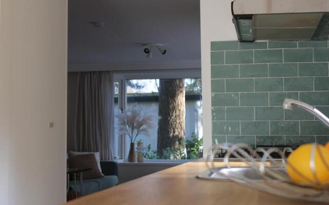 Sfeervol vakantiehuisje in bosrijke omgeving