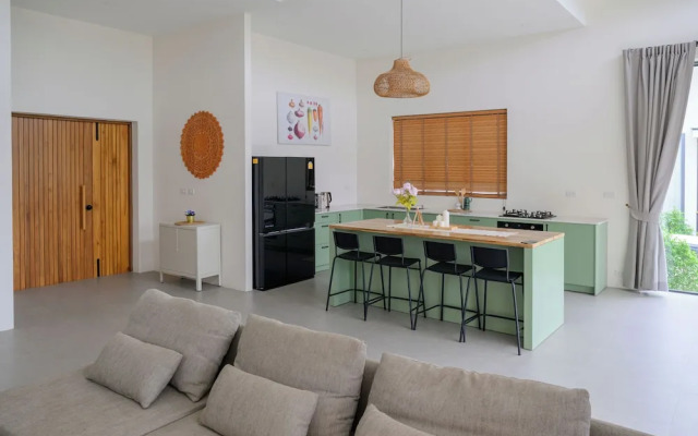 Tropical Poolside Retreat by Sea N' Rent