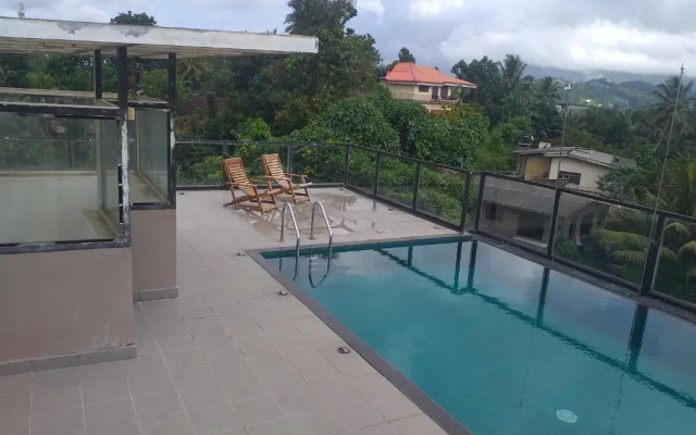 OYO 557 De Mansion