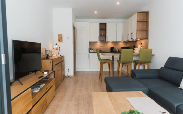 Ferienwohnung Bergsonne mit Sonnenbalkon und Tiefgaragen Parkplatz