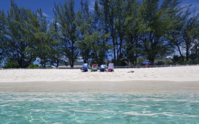 Sunrise Waterways by Cayman Vacation