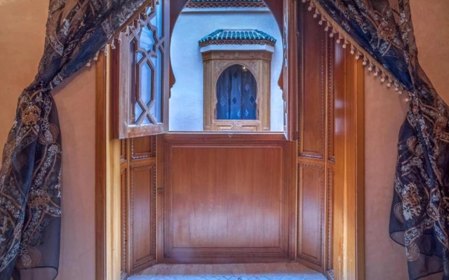 "room in Guest Room - Riad Lakouas Triple Room With Pool View"