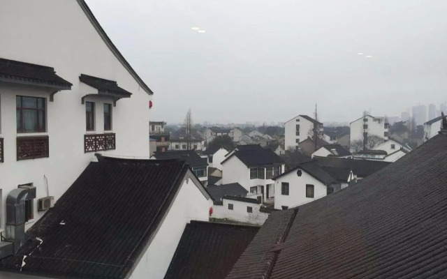 Suzhou Luzhi Riverside Inn Hostel