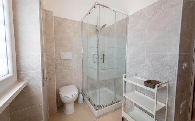 Casa Rosa Beige e Blu