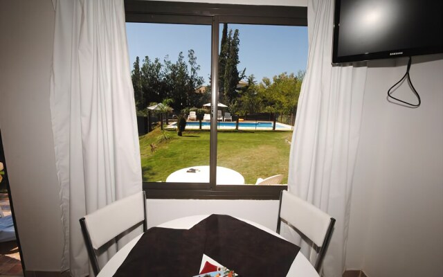 Aguaribay Apart Cabañas