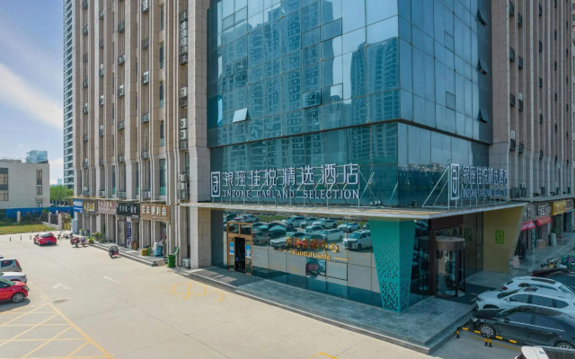 Ginza Jiayue Select Hotel (Qihe Wanda Plaza Spring City Oulebao)