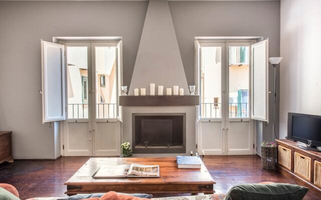 Terrazza e stile sui tetti della Kalsa