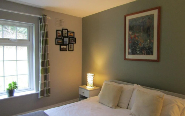 The Rose Garden Bed & Breakfast and Cafe