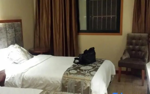 Yi Long Hua Chen Impress Business Hotel