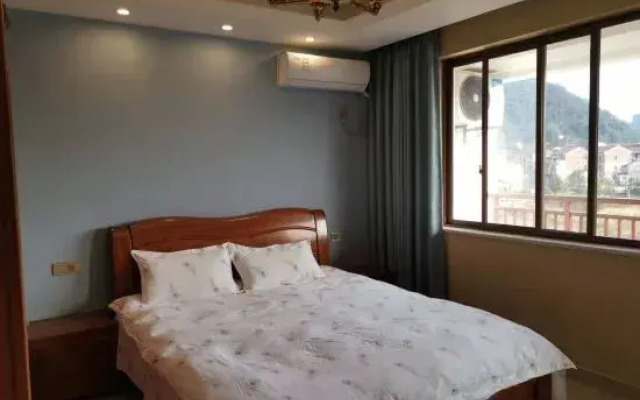 Xinchang Guanjing Homestay