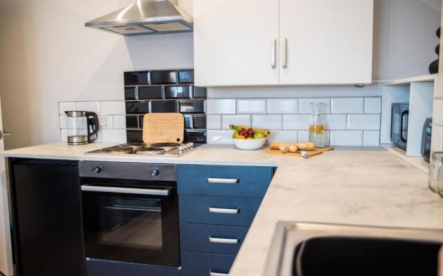 Derby's Beach Suites by Sasco Apartments