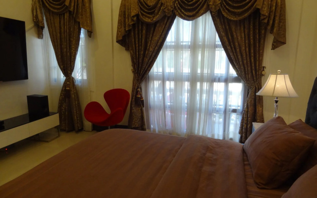 The Executive Villa Inn & Suites