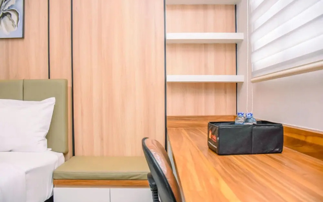Nice And Cozy Studio At Evenciio Apartment