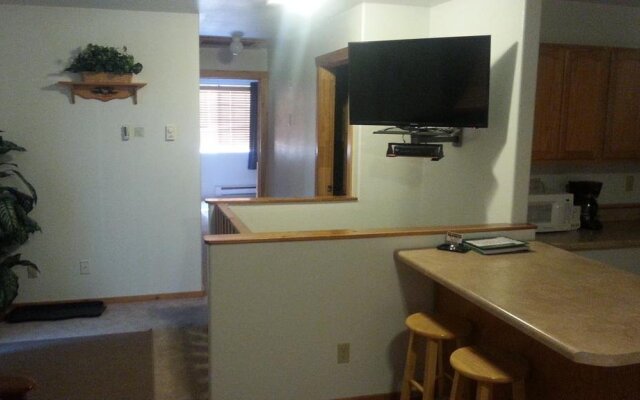 Wolf Den Log Cabin Motel and RV Park