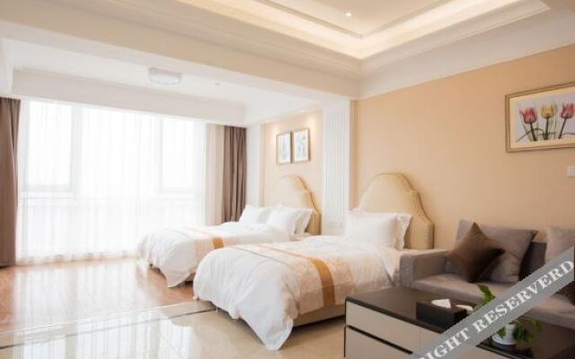 Baiya Light Luxury Holiday Apartment (Yangzhou Railway Station Jinghuacheng Branch)