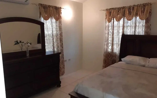 Charming 2-bed House in Portmore Gated Community