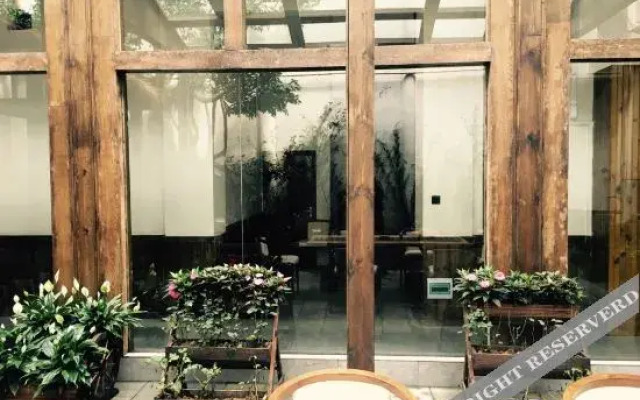 Enshi love Qingjiang hotel(Tujia daughter City store)