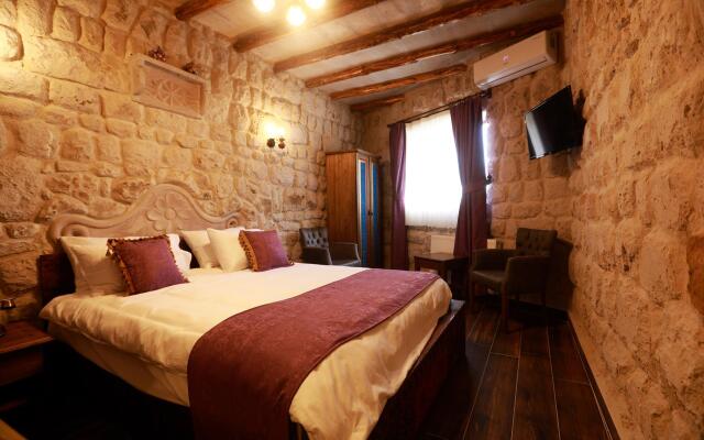 Ada Cave Suites Hotel