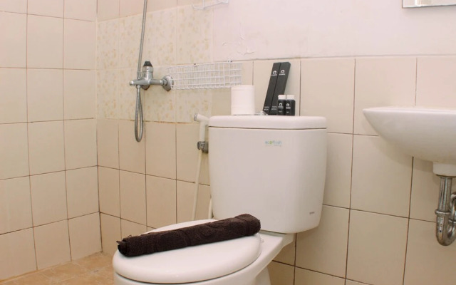 Warm And Simply Studio Room At Azalea Suites Apartment