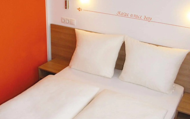 Orange Hotel und Apartments
