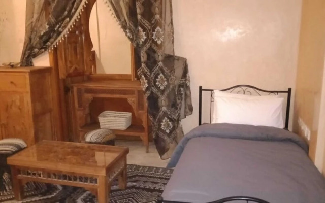 "room in Guest Room - Riad Lakouas Triple Room With Pool View"