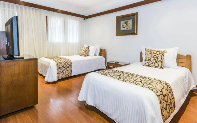 Travelers Suites Condominio Plenitud