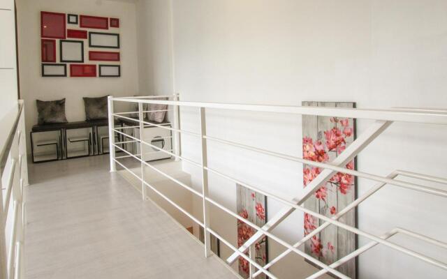 SIGLO SUITES @ The Gramercy Residences