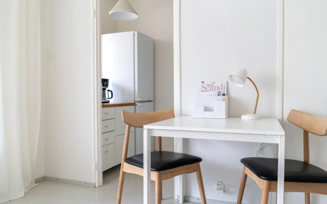 Upper floor studio with a balcony