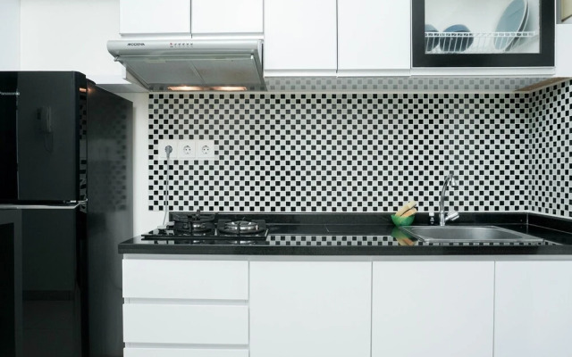 Modern 1BR Apartment at Central Park Residence By Travelio