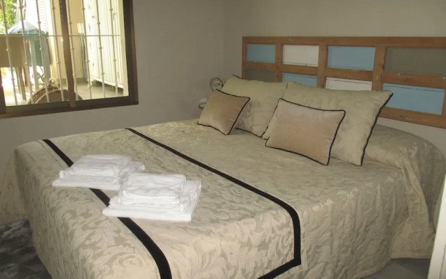 Apartamento Bizcocheros con piscina y jardin