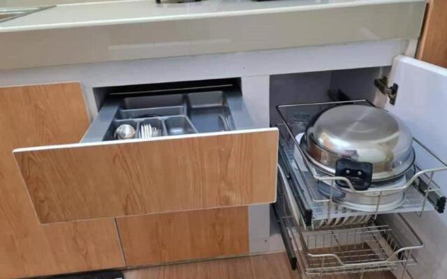 OYO 936 Yumis Condotel Trees Residences