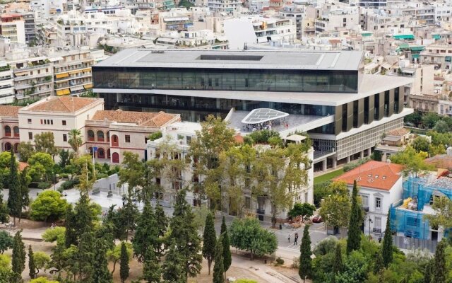 Your Home under the Acropolis Roofdeck