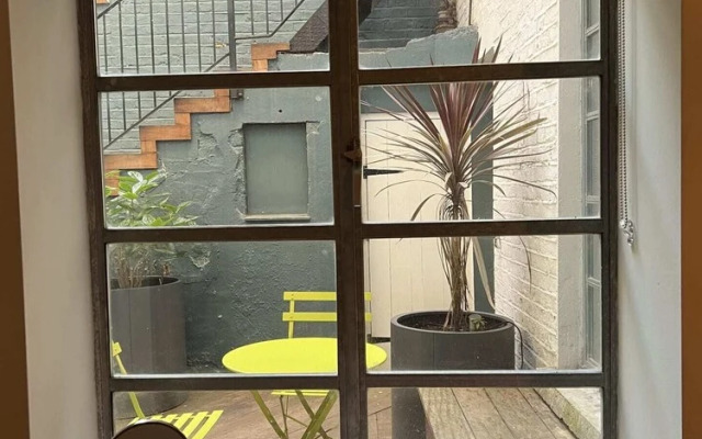 Stylish 2 Bedroom Converted Victorian Storefront