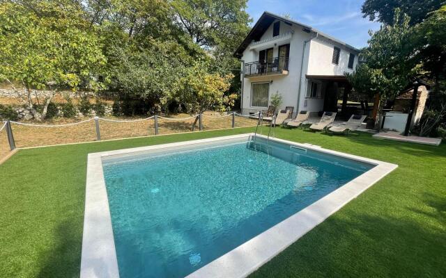 Vacation home with private swimming pool surrounded by nature