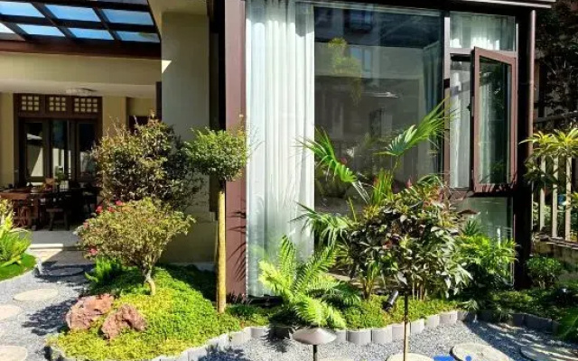 Qingkai Garden Homestay (Dai Ethnic Ancient Town)
